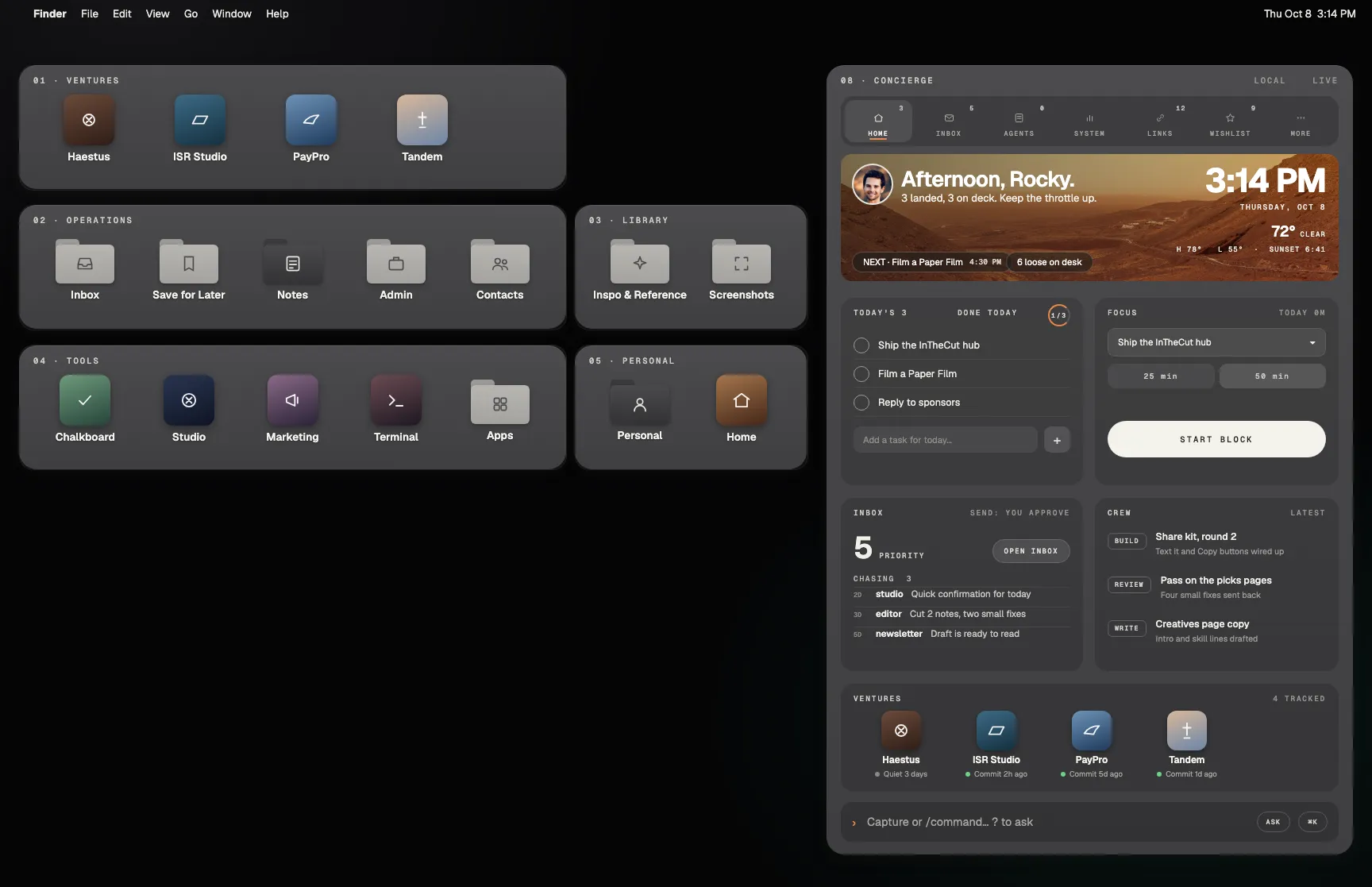 The Command Deck wallpaper in use: dark folder trays with demo icons and a concierge widget on near-black
