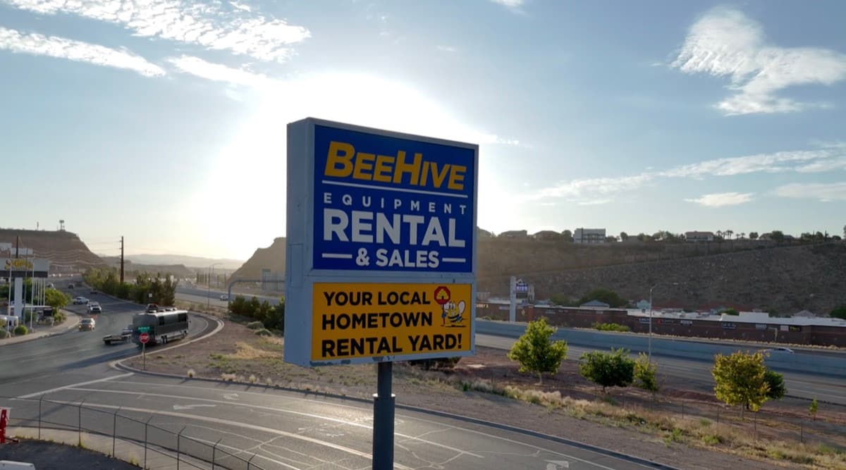 BeeHive Equipment Rental and Sales sign beside Highland Drive in St. George, Utah