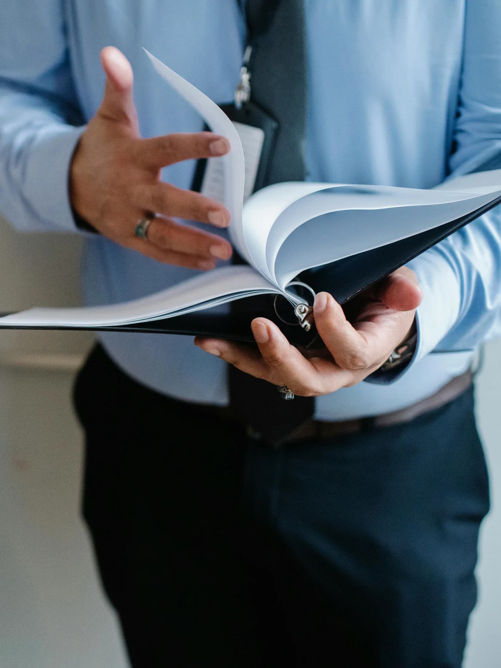 A closing professional reviewing documents, from Prospect Title’s public media library
